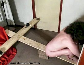 BDSM: crucifixion of a crossdresser in South Africa, 2016-02-02, 6 photos, topless